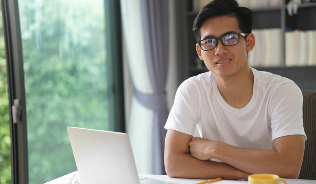 Business owner weighing whether to invest in monthly SEO while reviewing ranking data